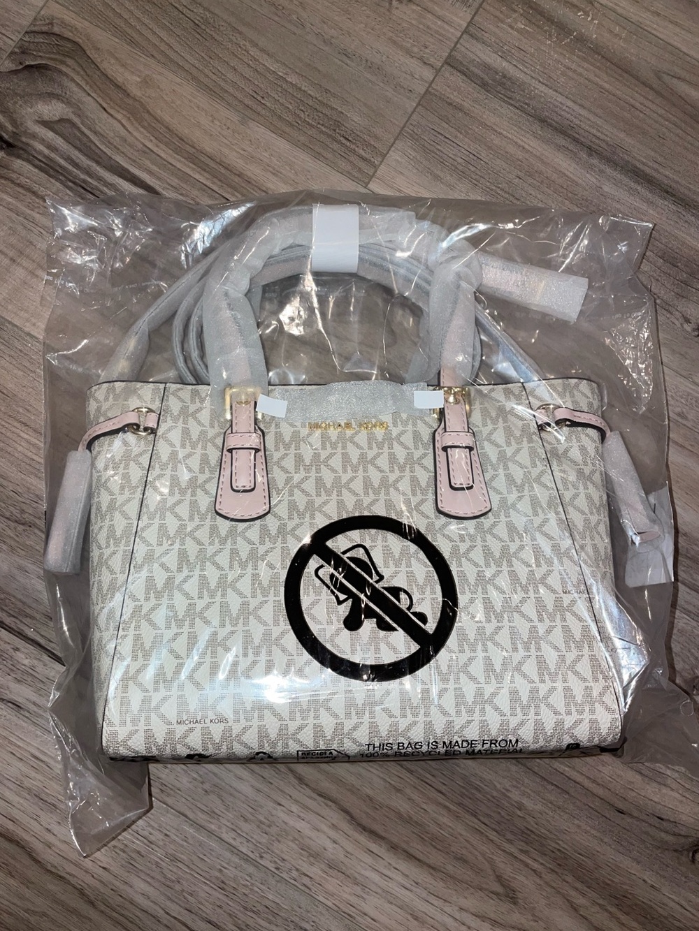 Michael Kors Voyager Extra-Small Signature Logo Convertible Crossbody Bag